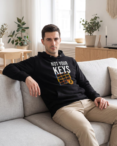 Not Your Keys on a black hoodie, scandinavian living room