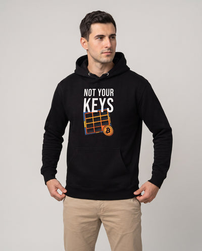 Not Your Keys on a black hoodie, studio front