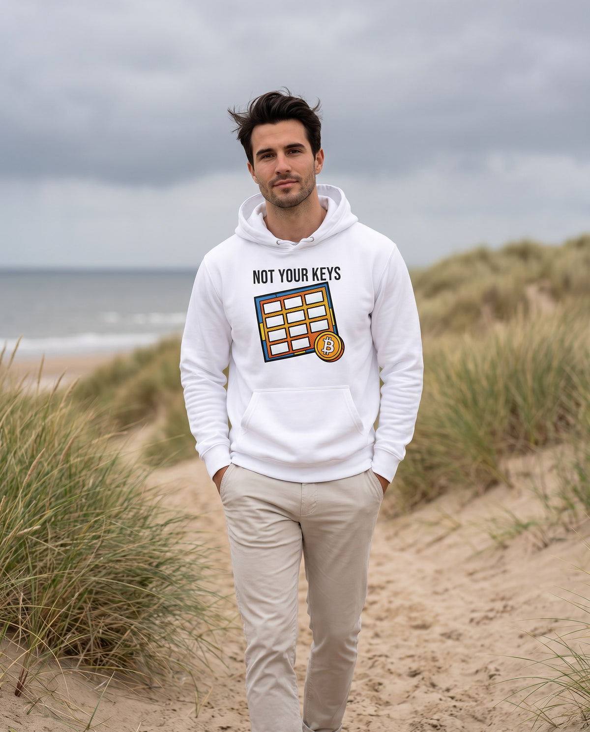 Not Your Keys on a white hoodie, coastal path