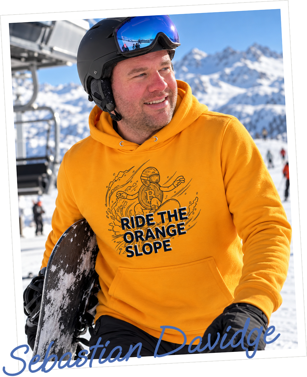 Sebastian Davidge, Co-founder of Bitcoin Artwear, in the Ride The Orange Slope Snowboard Hoodie on a Ski Holiday, signed